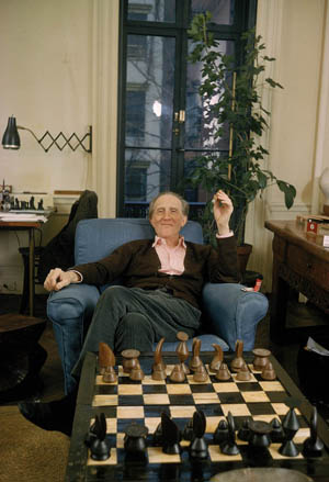 Photo of Marcel Duchamp with chessboard